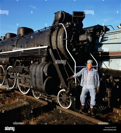 Engineer poses with old locomotive, Steamtown National Historic Site ...