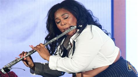 Here's How Lizzo Got Started Playing The Flute