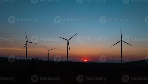 wind turbine field at beautiful sunset sky 8560529 Stock Photo at Vecteezy