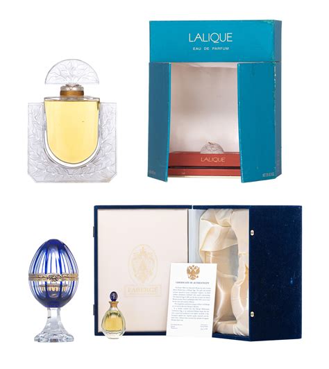 Lot - A large Lalique 20thC Anniversary Limited Edition perfume bottle, 600 ML, added a Fabergé ...