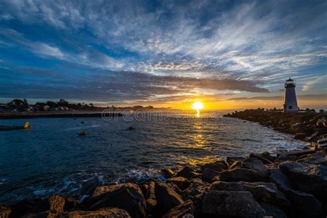 Santa Cruz`s Breakwater Lighthouse at Sunrise Stock Photo - Image of boardwalk, bluff: 170444682