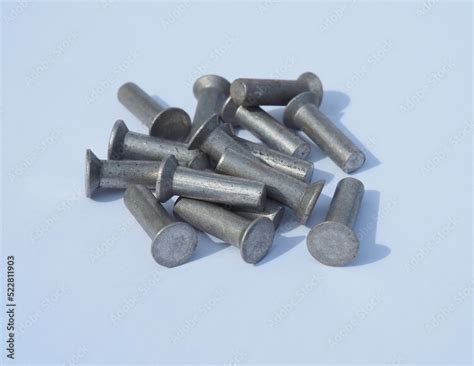 Aluminum rivets. Different sizes and diameters of rivets Stock Photo | Adobe Stock