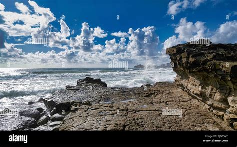 An aerial view of rocky beach in background of sea in Queensland Stock Photo - Alamy