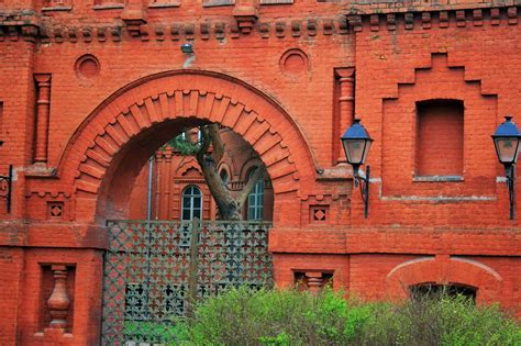 Red Brick Wall And Gate In Park Free Stock Photo - Public Domain Pictures