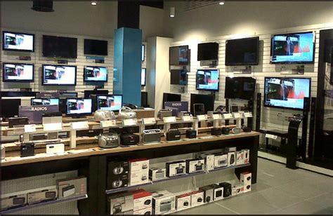 TV wall and playtables, Currys PC World Westfield Stratford Shop Counter Design, Home Appliance ...