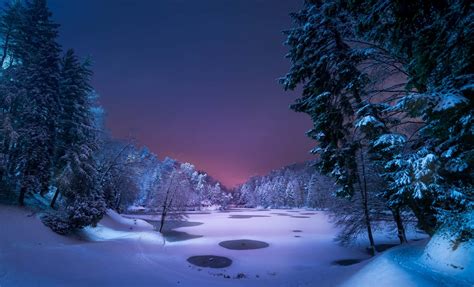 Download Winter Night Desktop With A Frozen Lake Wallpaper | Wallpapers.com