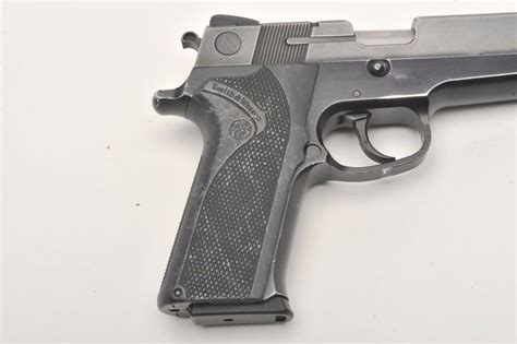 Smith & Wesson Model 410 semi-automatic pistol, .40 S&W caliber, 4” barrel, grey and black dual fi