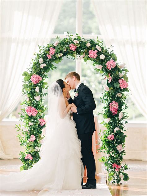 Wedding Arch With Greenery and Pink Hydrangeas