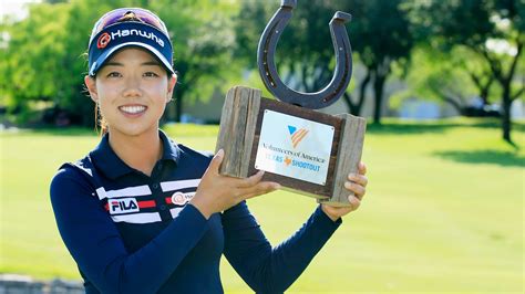 Jenny Shin poses with the trophy after her two-stroke victory at the ...