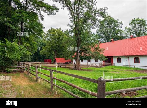 Horse stud and breeding farm in Florianka. Red metal sheet on the roof covering Stock Photo - Alamy