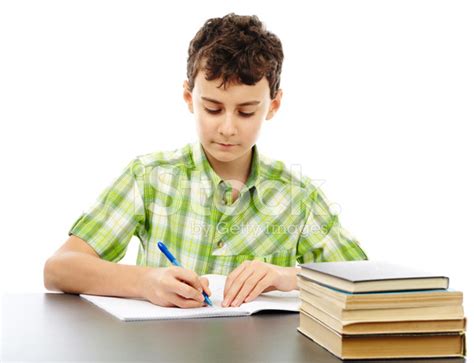 Student Doing Homework Stock Photo | Royalty-Free | FreeImages