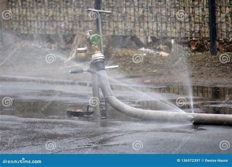 Water from the hydrant stock image. Image of rain, street - 136972397