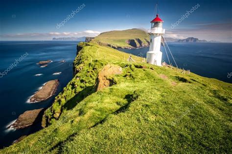 Lighthouse on Mykines, Faroe islands Stock Photo by ©fedevphoto 91453444