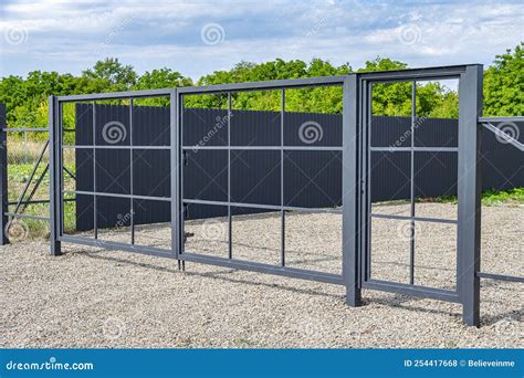 Installation of Metal Gates. Stock Photo - Image of border, worker ...