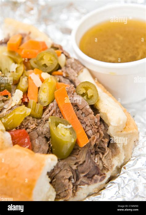 Chicago style Italian beef sandwich with giardiniera and dipping sauce ...