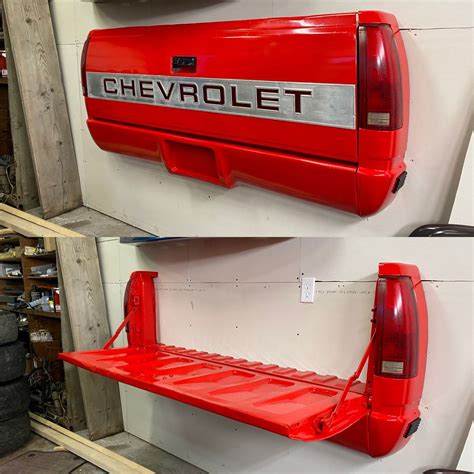 two red shelves with chevrolet emblems on them