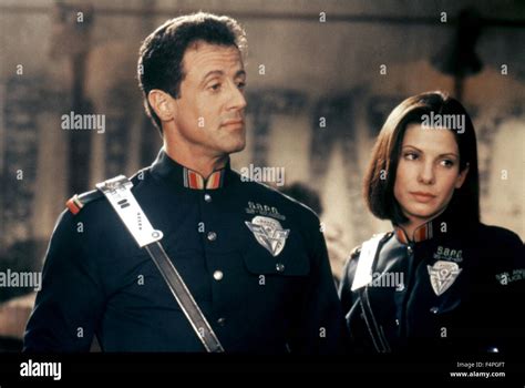 Sylvester Stallone and Sandra Bullock / Demolition Man / 1993 Stock Photo, Royalty Free Image ...