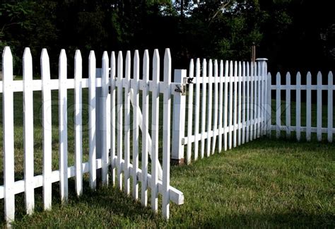 White picket fence with gate opened | Stock Photo | Colourbox