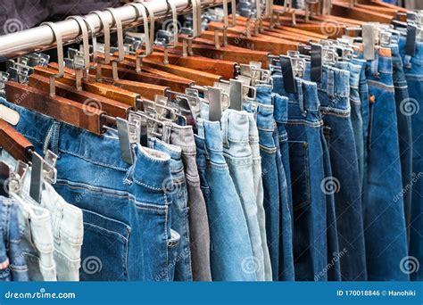 Jeans in Second Hand Clothes Store - Denim Pants Stock Photo - Image of ...