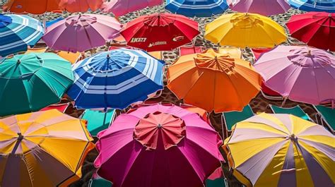 Premium Photo | A colorful array of beach umbrellas and loungers