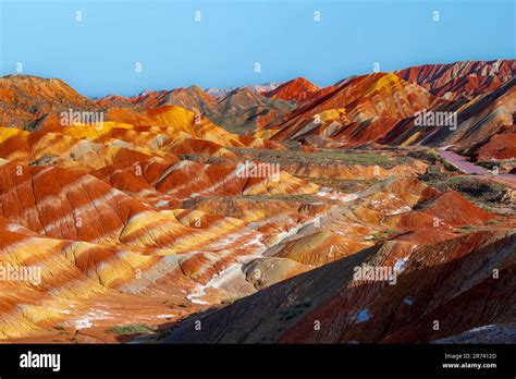 Amazing scenery of Rainbow mountain and blue sky background in sunset. Zhangye Danxia National ...