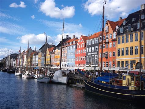 Nyhavn: Canal with colorful houses in Copenhagen - Travelers