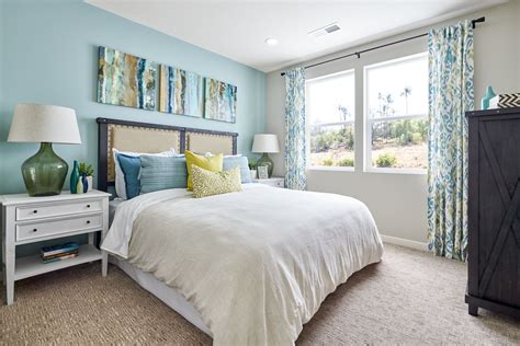 A coastal themed master bedroom. The color combination of watercolors ...