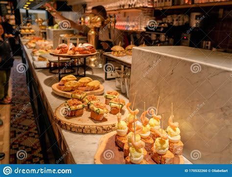 Traditional Spanish Snacks or Tapas Called Pintxos in a Bar Counter Editorial Image - Image of ...