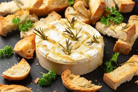 Baked Camembert Cheese with Rosemary, Garlic and Toasted Bread Stock Image - Image of fresh ...