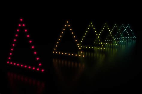 Premium Photo | Closeup on a row of triangle shaped multi colored led lights