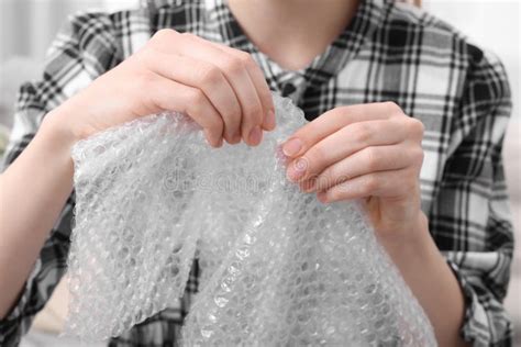 Woman Popping Bubble Wrap, Closeup. Stress Relief Stock Image - Image ...