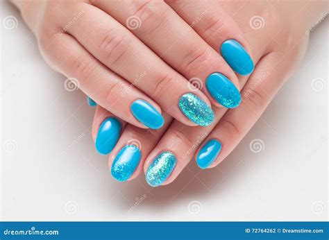 Blue Nail Polish with Glitter on the Ring Finger Stock Photo - Image of clean, oval: 72764262