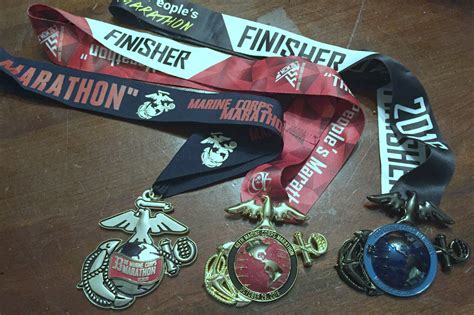 marine-corps-marathon-2016-2015-2008-medals - MCM Mama Runs