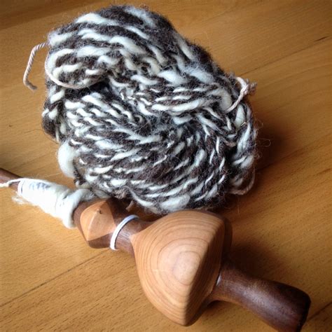 Another try at spinning wool – hands follow heart