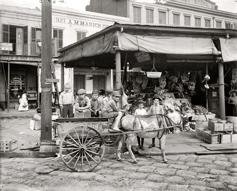 New Orleans circa 1910. "A corner of the French Market." At the produce ...