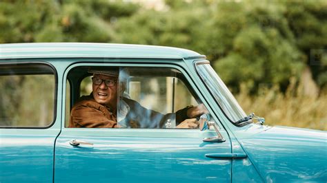 Old man driving a classic car stock photo (155922) - YouWorkForThem