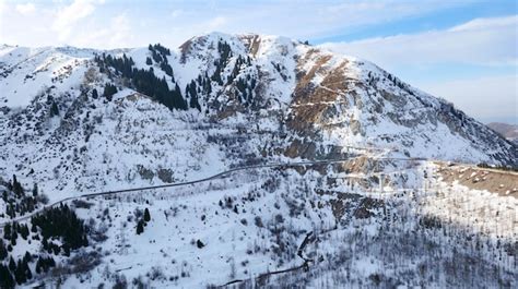 Premium Photo | Snowcovered mountain with a highway