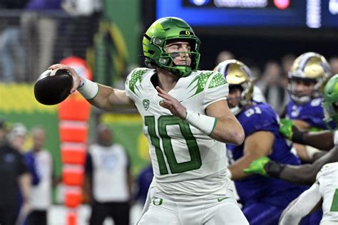 Oregon quarterback Bo Nix dejected after loss in Pac-12 championship, mum on status for bowl game