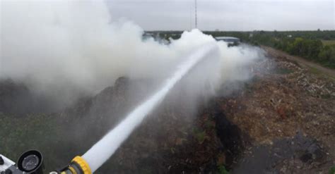 Crews fight massive mulch pile on fire