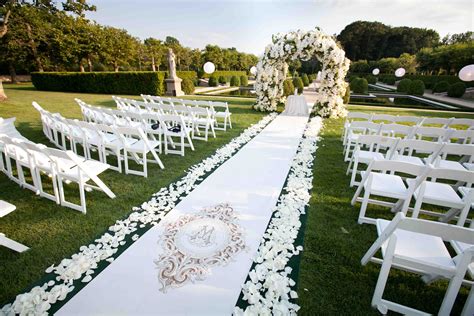 Wedding Ceremony Ideas: Flower-Covered Wedding Arch - Inside Weddings