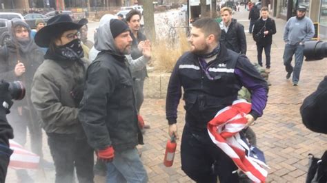 Street fight breaks out over flag burning | CNN