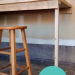 Easy DIY Wall Mounted Folding Table Workbench from a Door | Remodelaholic