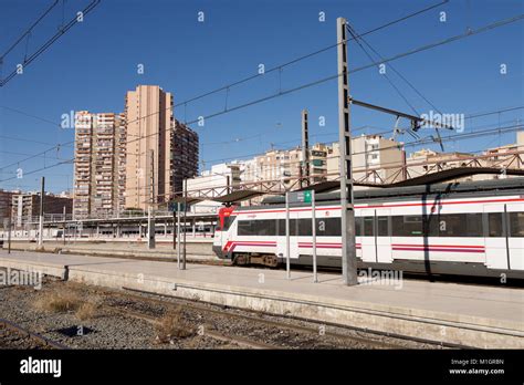 Train at railway station in Alicante, Spain Stock Photo - Alamy