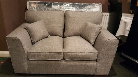 2 seater grey fabric sofa | in Kettering, Northamptonshire | Gumtree