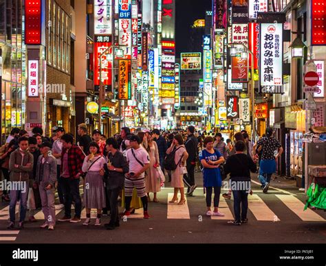 Tokyo Shinjuku by night - a busy place for nightlife - TOKYO / JAPAN - JUNE 17, 2018 Stock Photo ...