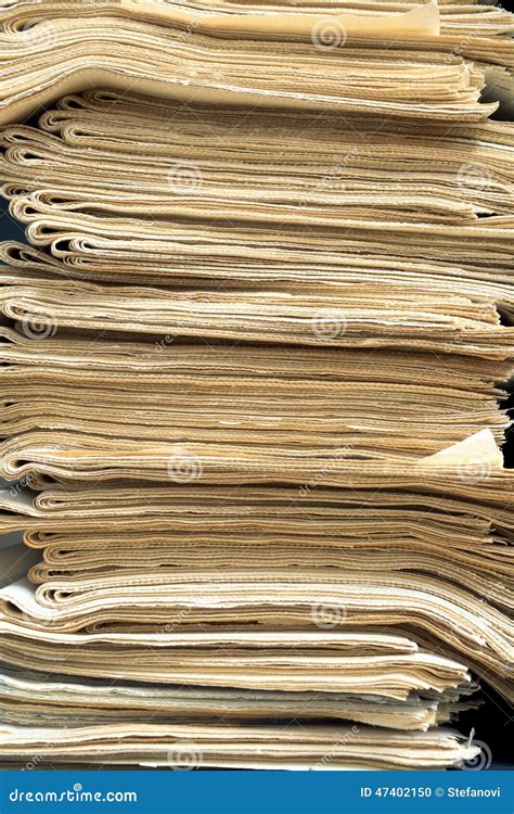 A stack of old newspapers stock photo. Image of environmental - 47402150