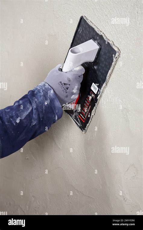 Roughcast, plastering trowel, new homes under construction, construction site Stock Photo - Alamy