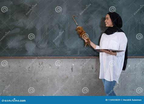 Teacher Pointing at Blackboard Stock Image - Image of teacher, female ...