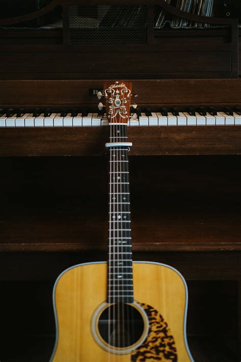 Download Piano And Guitar Music Instruments Wallpaper | Wallpapers.com