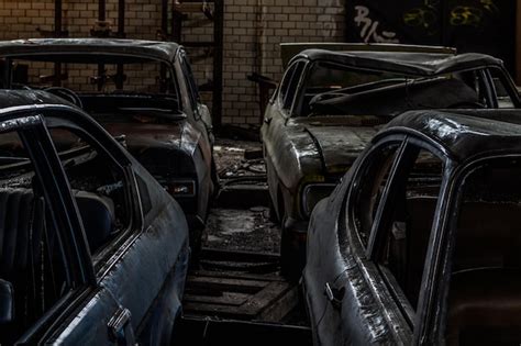 Premium Photo | Abandoned cars at junkyard